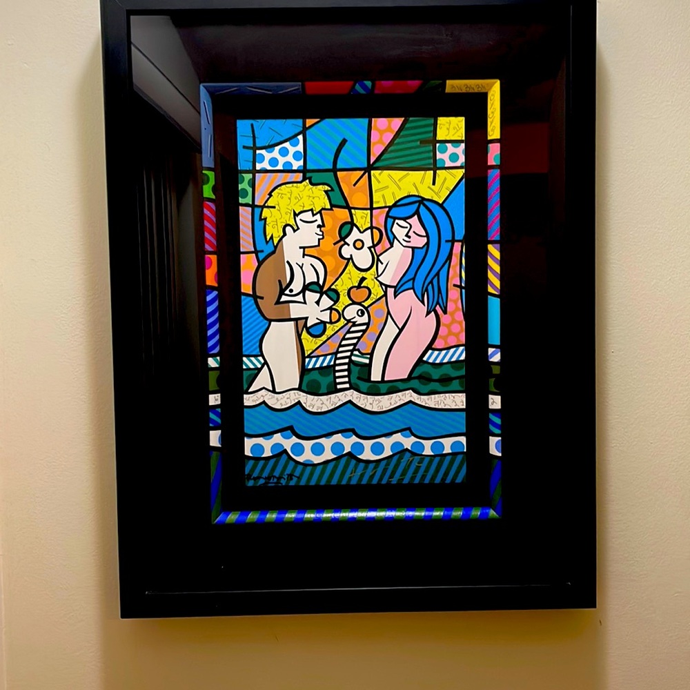 This piece is titled “Adam and Eve”from the world- renowned artist Romero Britto